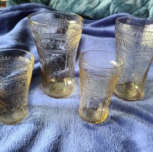 Four pieces of Amber Depression Glass